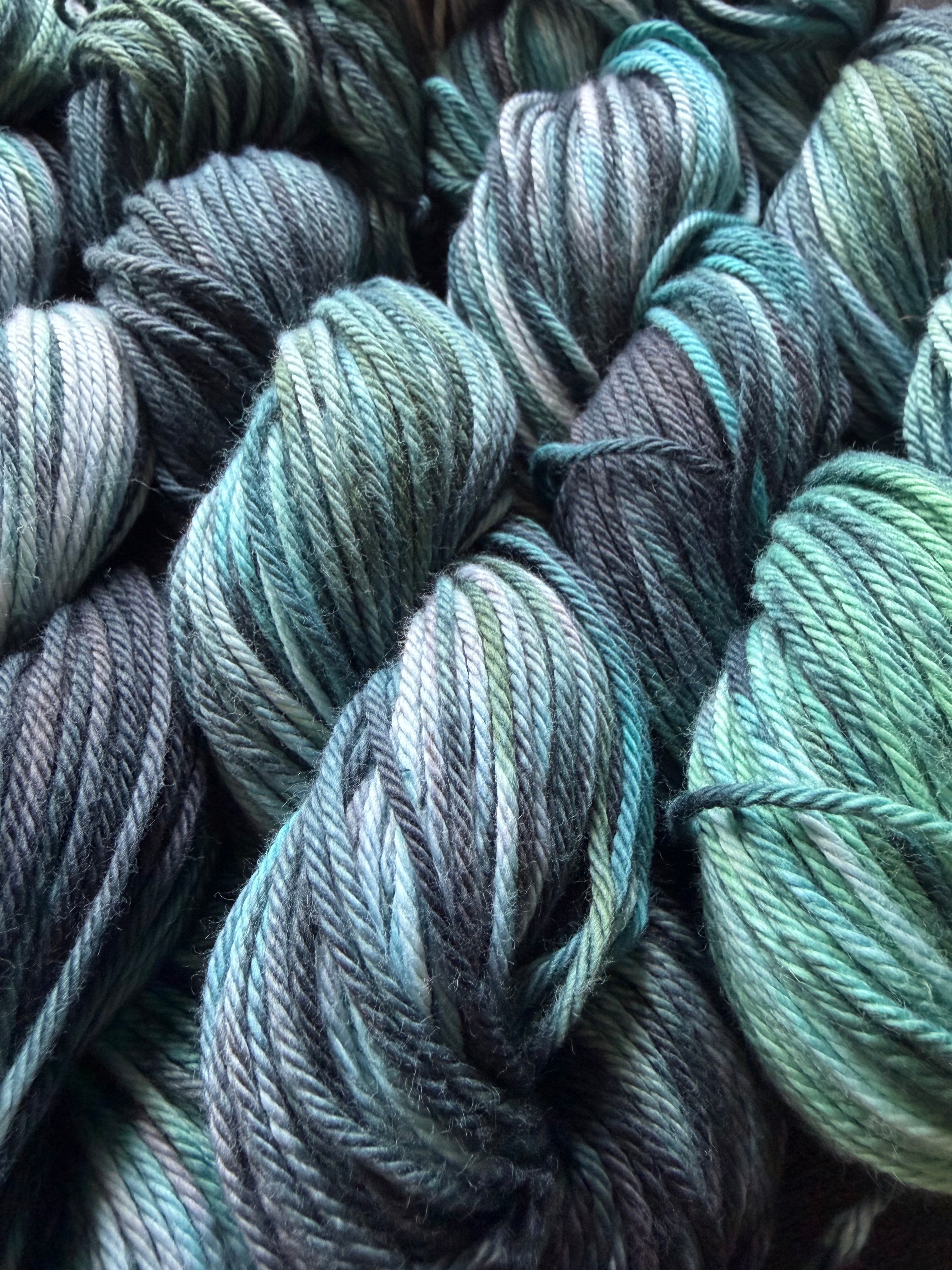 cunning serpent yarn – hand-dyed variegated green, grey & black skein for knitting & crochet